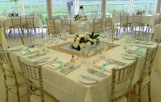 Clearspan Marquees - set for dining with square tables