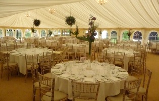Clearspan Marquees - set for dining with round tables